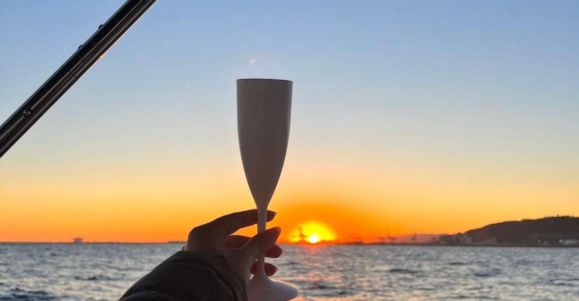 Barcelona: Sunset Sailboat Cruise With Open Bar - Key Points