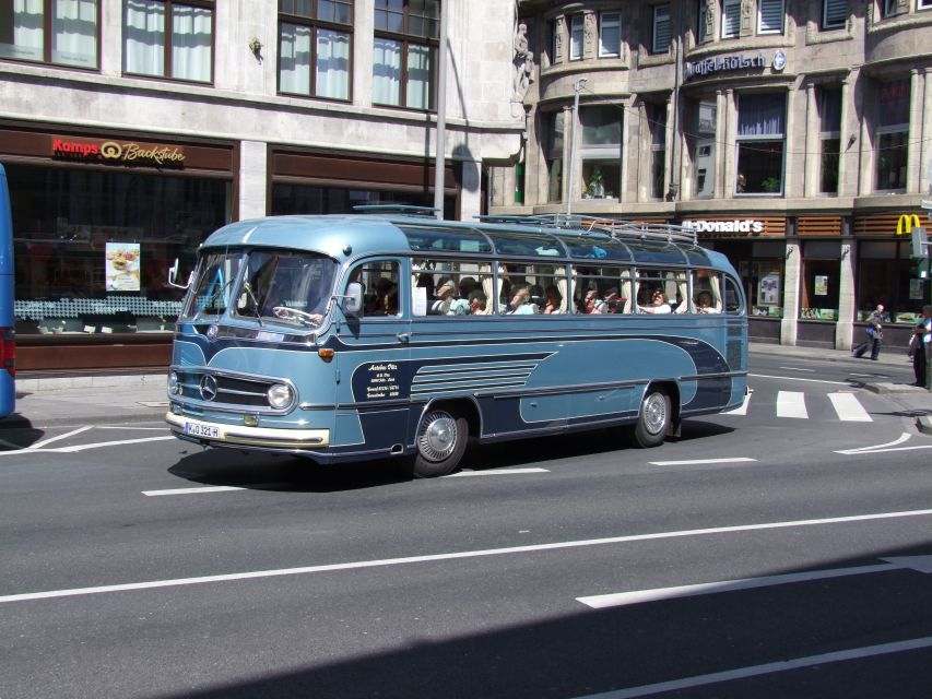 Cologne: Nostalgic Tour in German in Vintage Bus - Key Points