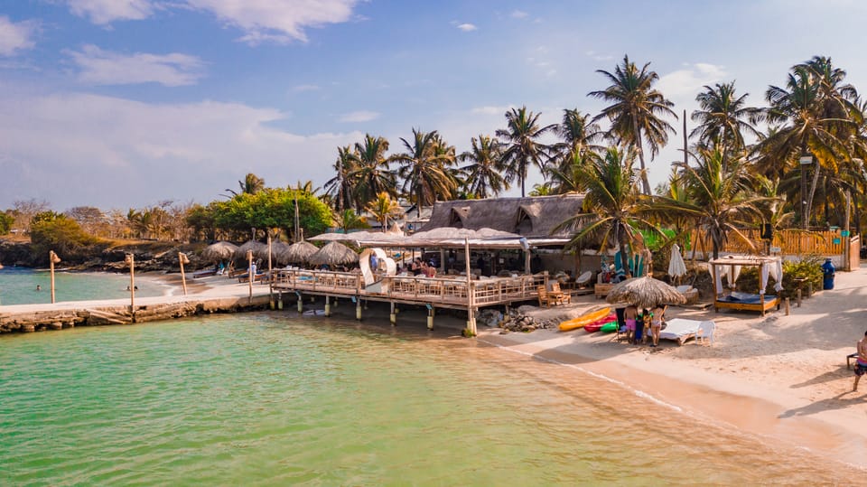 From Cartagena: Palmarito Beach With Buffet Lunch And Pool - Key Points