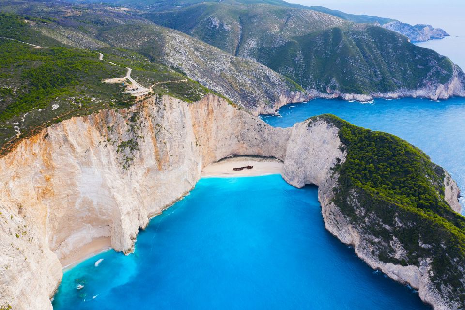 From Kefalonia: Blue Cave Boat Cruise & Shipwreck Photo Stop - Key Points