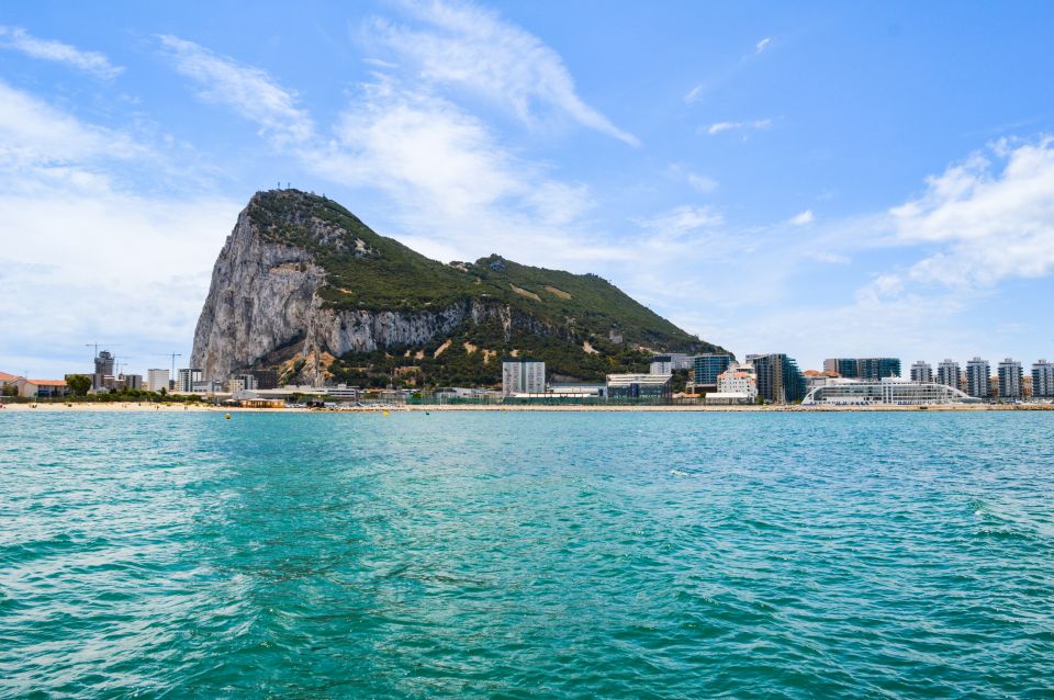 From Malaga: Day Trip to Gibraltar and Dolphin Boat Tour - Key Points