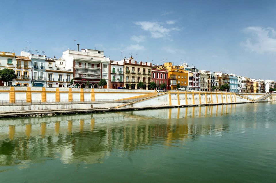 From Malaga: Seville Day Trip Guide Commentary on the Bus - Key Points