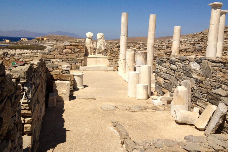 From Mykonos: Delos Archaeological Site Guided Evening Tour - Key Points