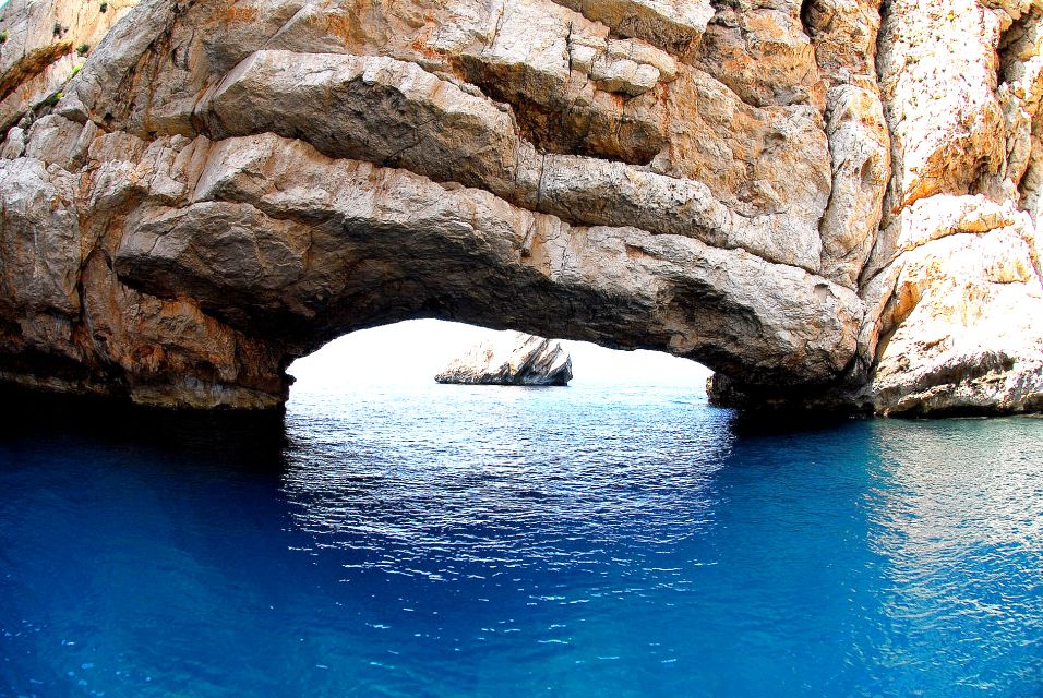 Ibiza: Snorkeling and SUP Paddle, Beach and Cave Boat Tour - Key Points