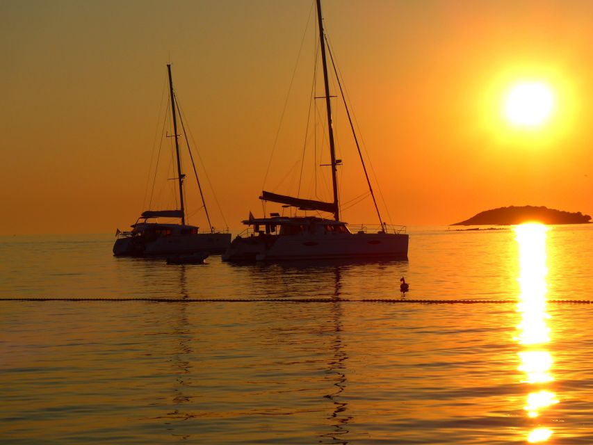 Milos: Kleftiko Bay Catamaran Cruise With Meal & Sunset View - Key Points