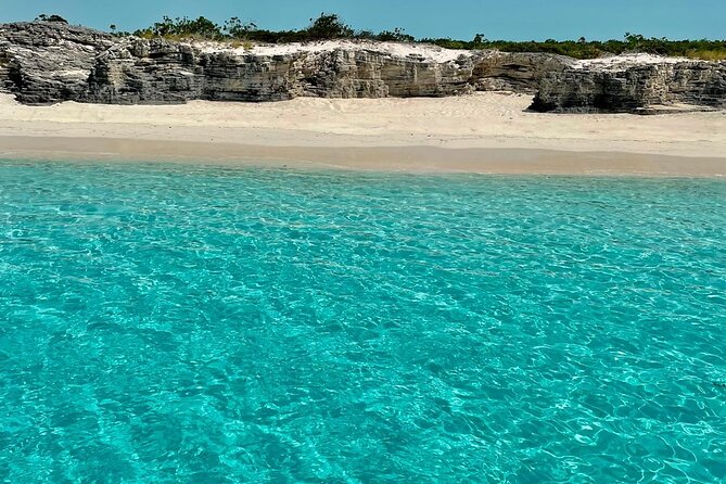 Private 7-Hour Catamaran Tour in Turks and Caicos - Itinerary Highlights