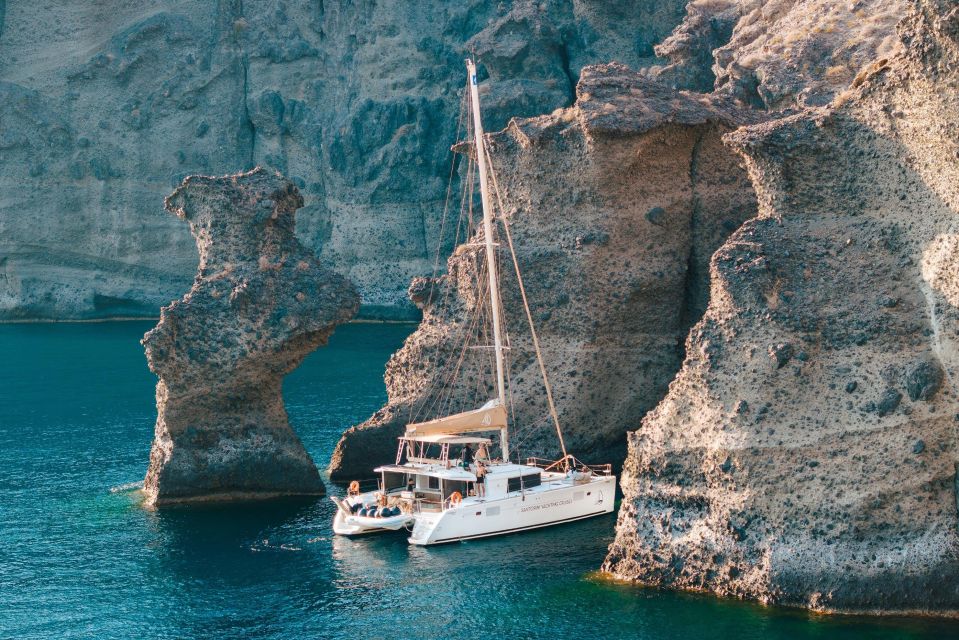 Santorini Catamaran Day Cruise: Lunch, Drinks and Transfers - Key Points