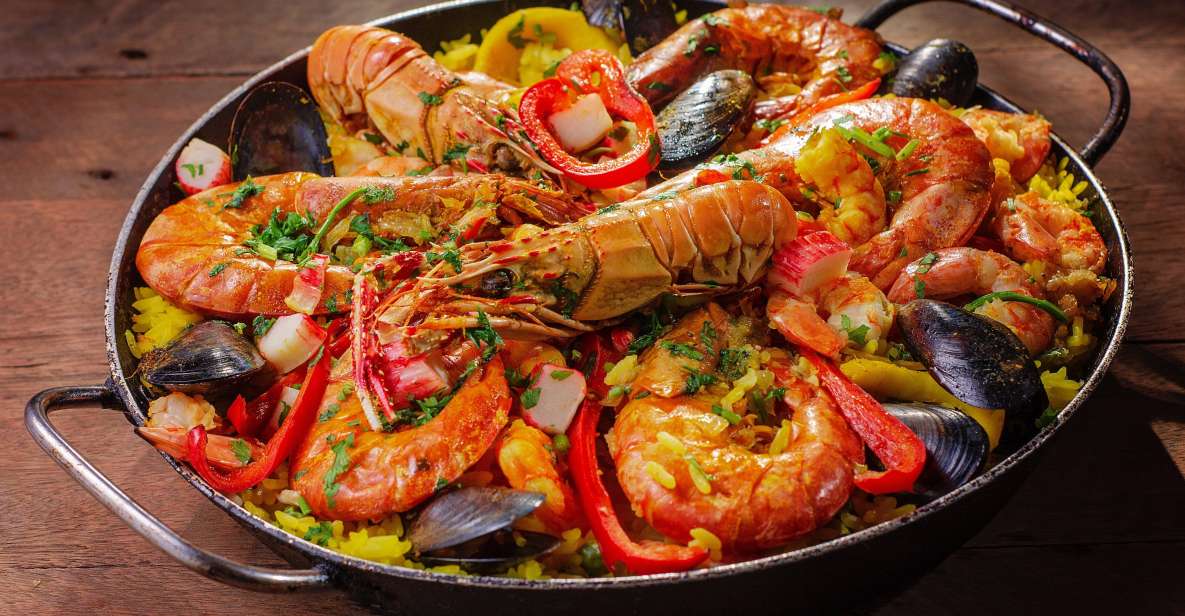 Tapas Tour Paella and Malaga Market With Official Guide - Key Points