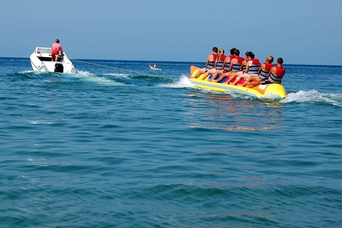 Catch a Ride to West Bay & Back to Port, Hotel, or Airport (Roundtrip Transfer)