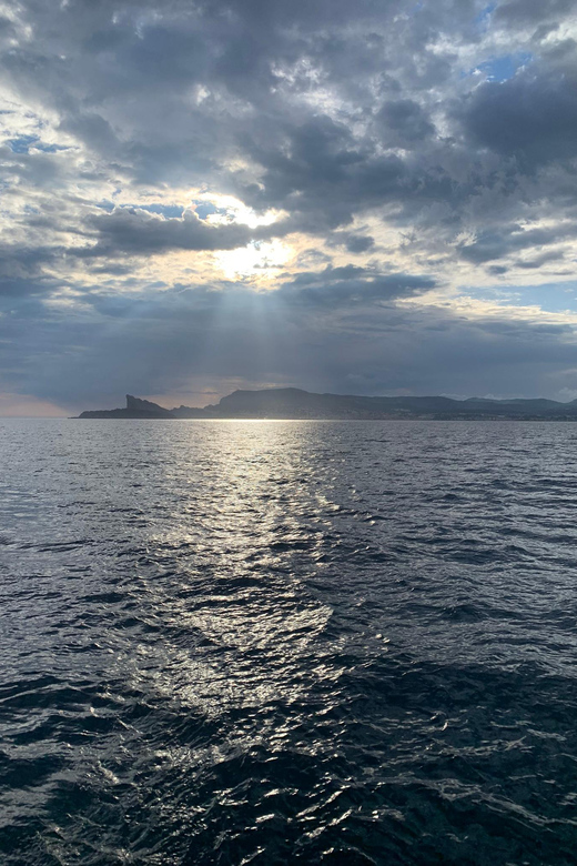 Departure From BRUSC Sunset on Sailing Catamaran