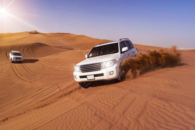 Doha: Desert Safari With Quad Bike ,Camel Ride and Sand Boarding