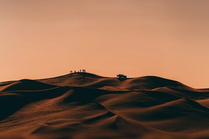 Dubai: Desert Safari 4x4 Dune With Camel Riding and Sandboarding - Key Activities Included