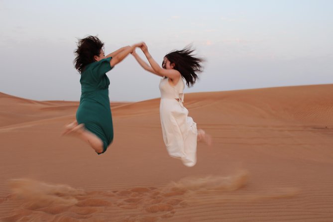 Evening Desert Safari on Red Dunes + Sandboarding + BBQ Dinner & Entertainment