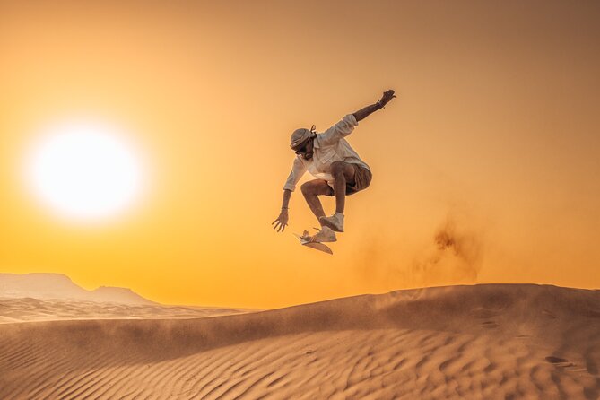 Private Sunset Desert Safari:Sandsurfing, Camel Ride & BBQ Dinner - Overview of the Experience