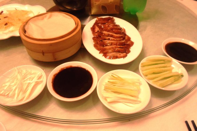 Private Tour to Pearl Market Acrobatic Show & Peking Duck Dinner
