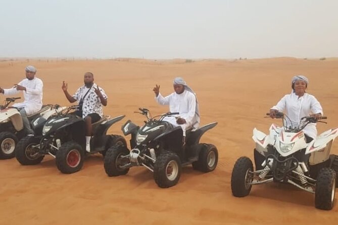 Quad Bike Dubai Desert Safari With BBQ Dinner Sandboard and Show