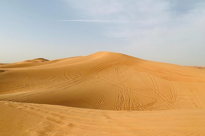 Red Dunes Safari By Quad Bike, Sandboarding, Camel Ride & BBQ Dinner