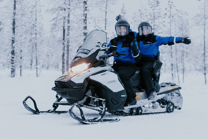 Snowmobile Ice Fishing in Levi