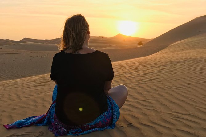 Abu Dhabi Desert Safari With BBQ Dinner,Sandboarding & Camel Ride - Highlights of the Experience