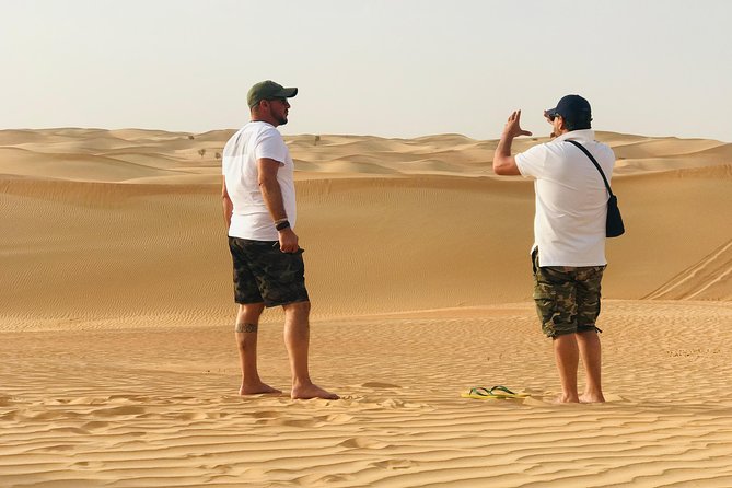 Abu Dhabi Morning Desert Safari,Dune Bashing,Sandboarding,Camel Riding&Quad Bike - Thrilling Sandboarding