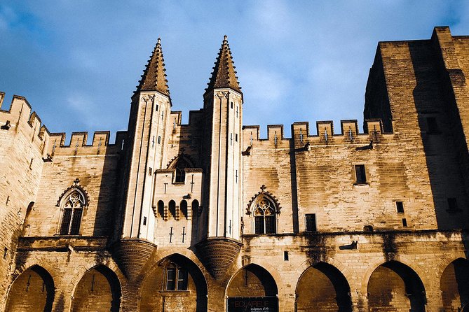 Avignon Half-Day Private Walking Tour, History, Culture, Markets - Palais Des Papes: Europes Largest Gothic Palace