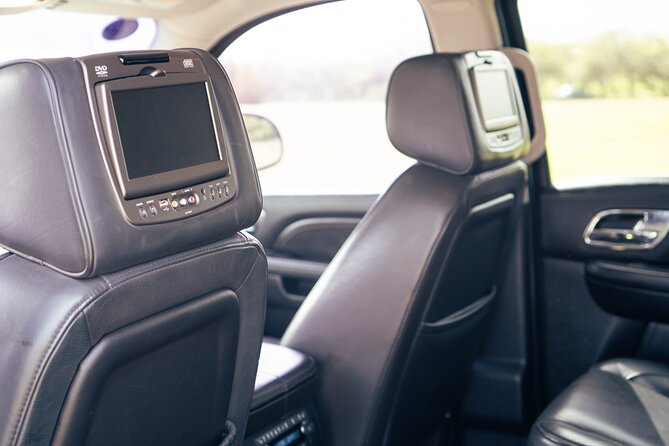 Black Cadillac Escalade/Suburban Round Trip Airport Transfer UVF - Meeting and Pickup Details