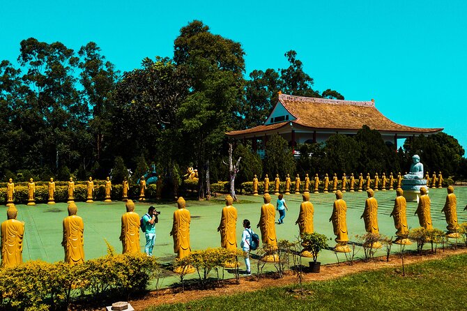 City Tour With Buddhist Temple and Muslim Mosque - Key Attractions