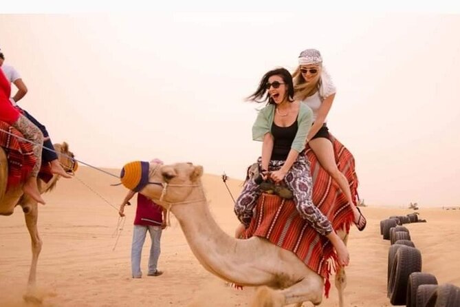 Desert Safari With BBQ Dinner, Camel Ride, Sand Boarding In Dubai - Exciting Dune Bashing Adventure
