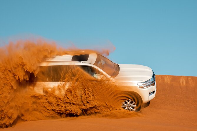 Dubai Desert Safari With Belly Dance, Fire Show and Tanura Show-The Full Package - Culinary Delights