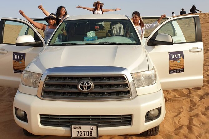 Dubai Desert Safari With Sandboarding & Camel Riding - Desert Camp Experience