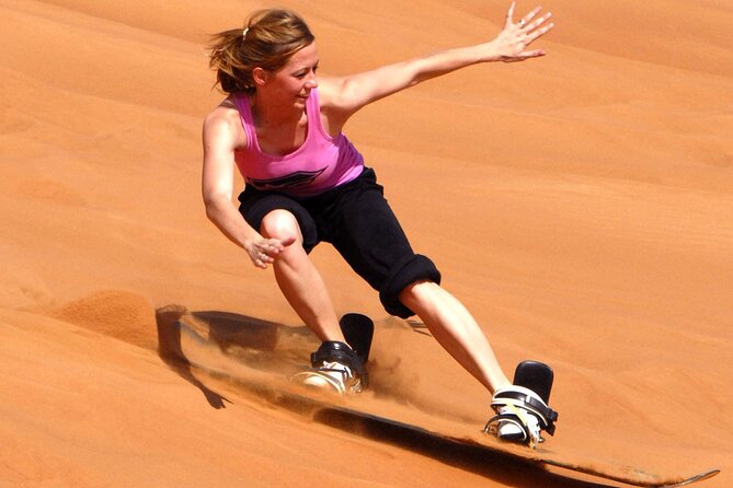 Dubai4x4 Evening Desert Safari,Camel Ride,4 Live Shows,BBQ Dinner - Camel Ride and Sandboarding