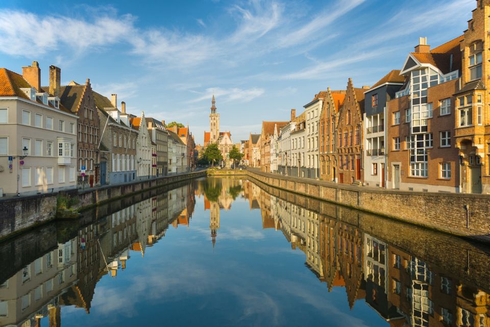 From Amsterdam: Day Trip to Bruges in Spanish or English - Itinerary and Key Attractions