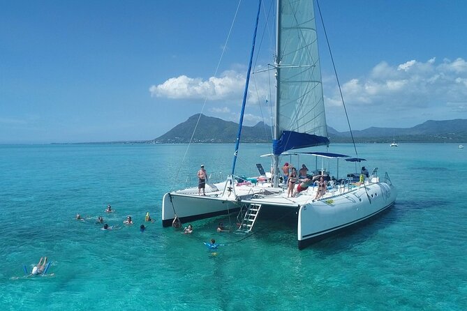Full Day Catamaran Cruise on Shared Basis to Bénitiers Island - Whats Included