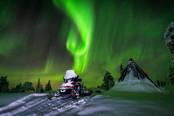 Hunting Northern Lights by Snowmobiles - Snowmobiling in Search of Aurora