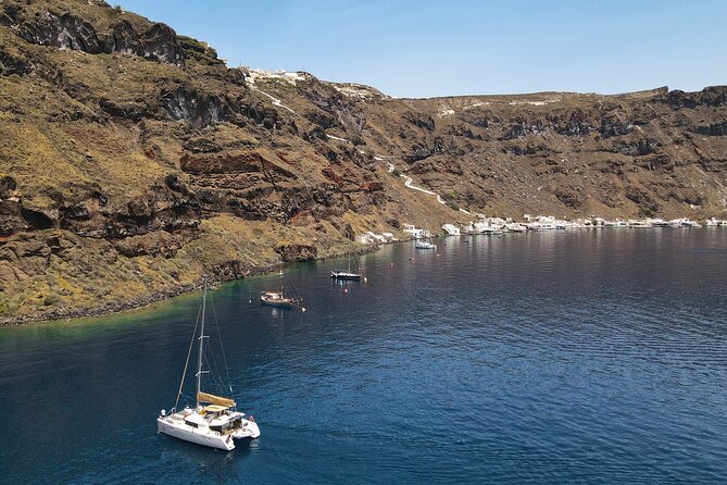 Luxury Santorini Sunset Cruise: Dinner, BBQ, Open Bar, Transfers - Inclusions and Amenities