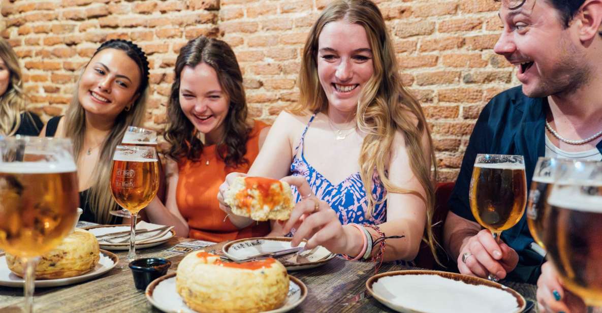 Madrid: Tapas Crawl Food Tour With 6 Tapas and 4 Drinks - Experience Highlights