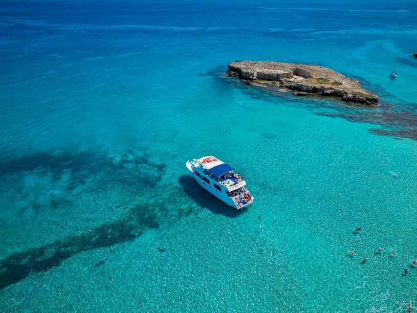 Paphos/Akamas: Blue Lagoon Bus & Boat Tour With Water Slide - Itinerary and Activities