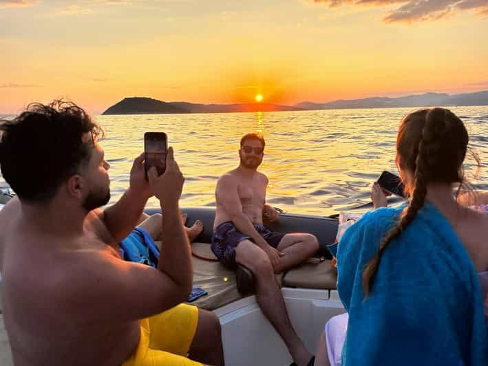 Private Sunset Boat Tour With Music and Wine - Itinerary Highlights