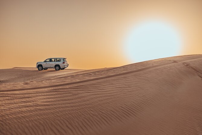 Private Sunset Desert Safari:Sandsurfing, Camel Ride & BBQ Dinner - Transportation Details