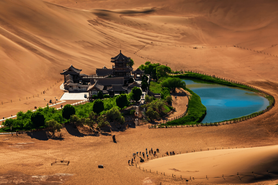 Private Tour Dunhuang Grottoes Mingshan Sand Dune Moon Lake - Inclusions