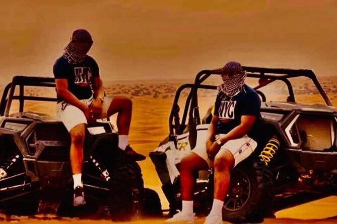 Quad Bike Dubai Desert Safari With BBQ Dinner Sandboard and Show - Camel Riding in the Desert