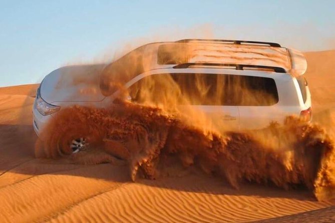 Red Dunes Desert Safari, Sand Board, Camel Ride With BBQ Dinner - Pickup and Meeting Details