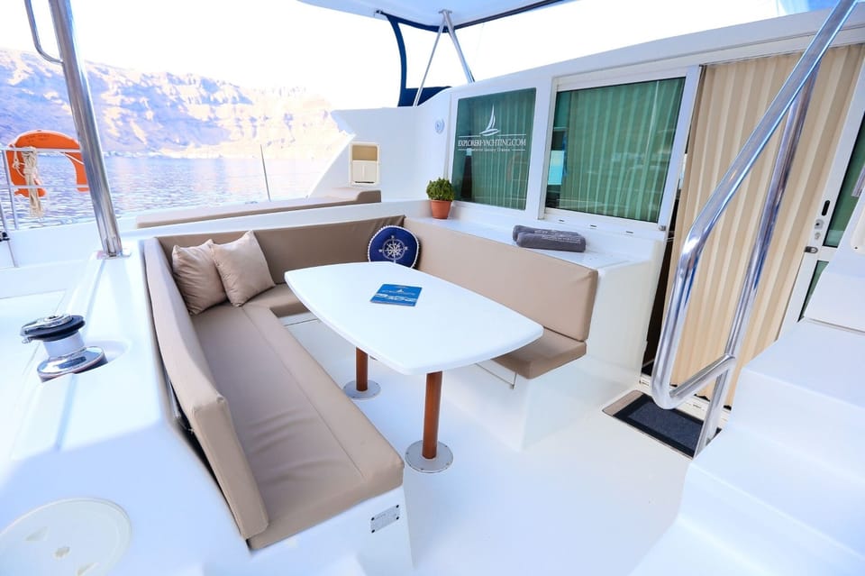 Santorini: Private Catamaran Sunset Cruise With Dinner - Experience Highlights