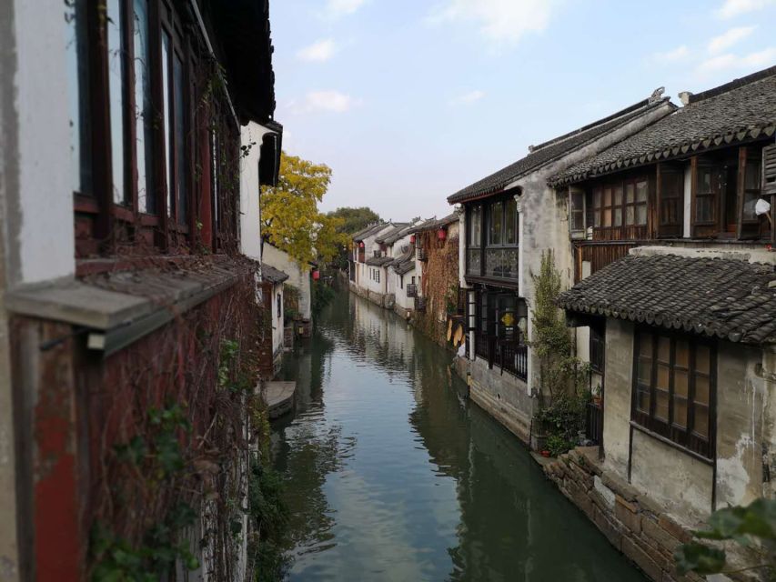 Su Zhou and Zhou Zhuang Water Village Day Tour - Itinerary and Experience