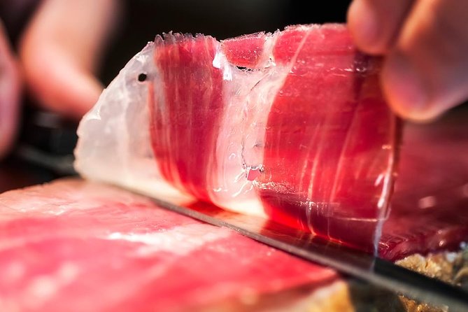 Tour Paella and Malaga Market With an Official Guide - Malagas Distinctive Tapas