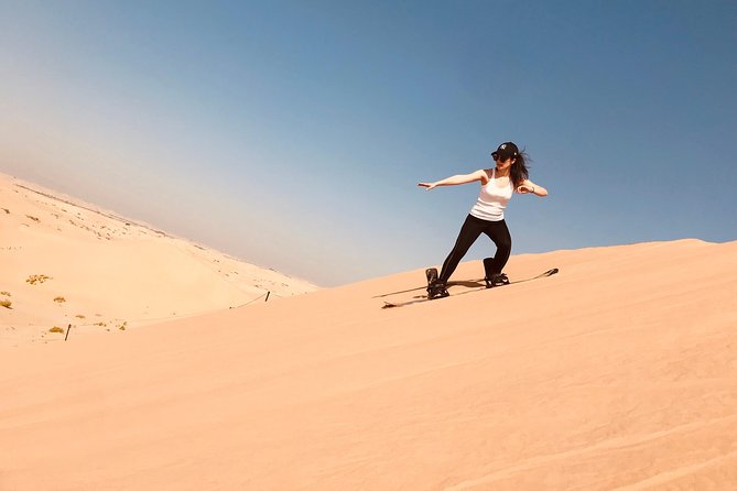 Abu Dhabi Desert Safari With BBQ Dinner,Sandboarding & Camel Ride - Included Activities and Amenities