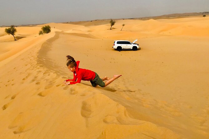 Abu Dhabi Morning Desert Safari,Dune Bashing,Sandboarding,Camel Riding&Quad Bike - Camel Riding Adventure