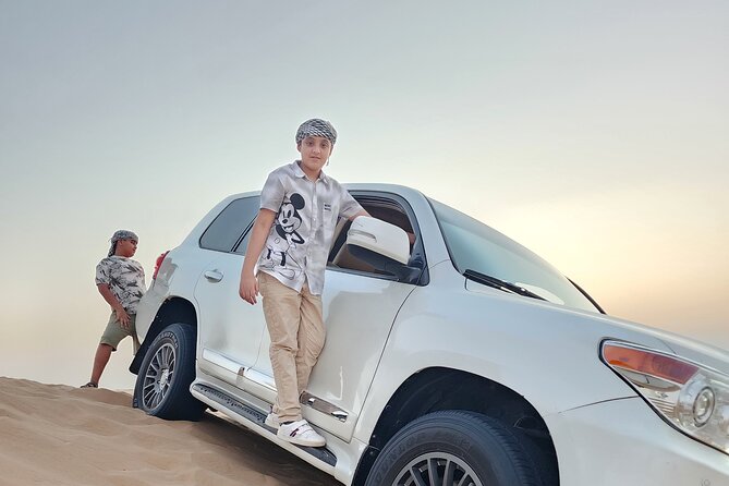 Desert Safari BBQ Dinner, Live Shows, ATV Bikes, Sandboarding - Camel Ride and Sandboarding