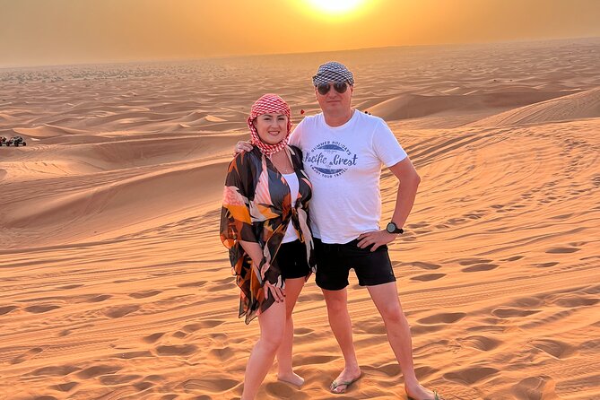 Dubai Desert Safari With Camel Ride, Sand Surf, & BBQ Dinner - Sand Surfing Adventures