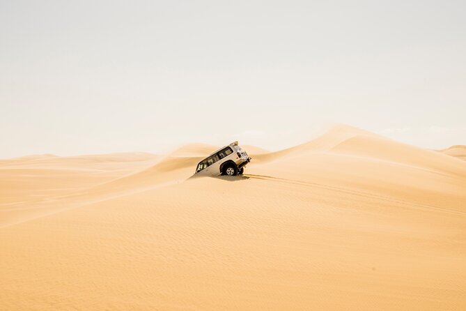 From Cairo: Desert Safari, Waterfalls, Sand Boarding and Camel Ride With Lunch - Inclusions and Transportation Details